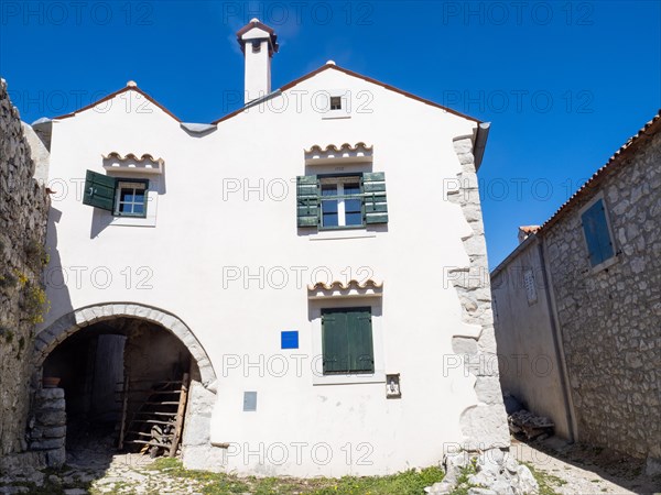 Old houses in the mountain village of Lubenice