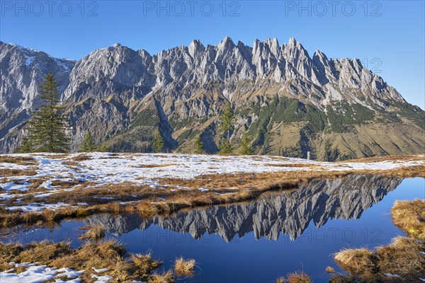 Reflection of the Mandlwaende in autumn