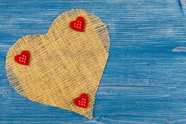 Linen heart on blue background