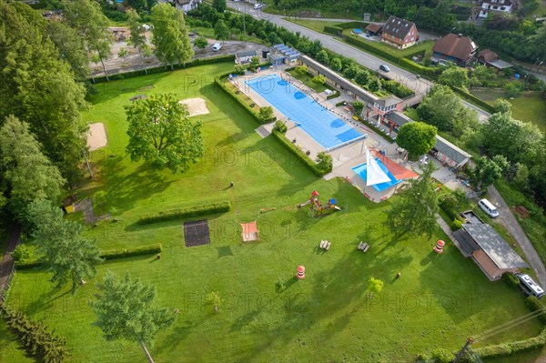 Empty outdoor pool from the air