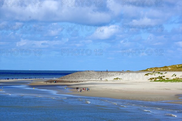 Wide sandy beach with few people