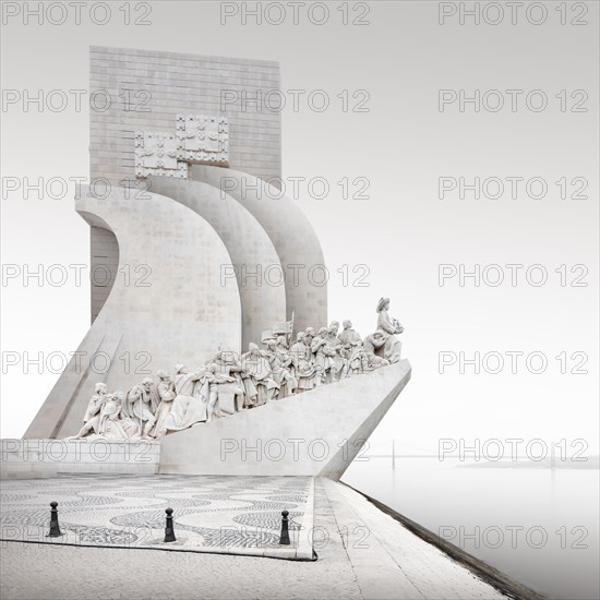Black and white long exposure of the seafarers' monument Padrao dos Descobrimentos on the river Tejo in Lisbon