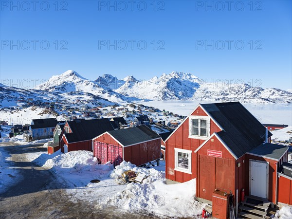 Colourful wooden houses in Tasiilaq in winter