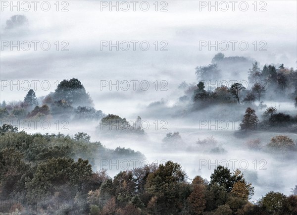 View from the Zeller Horn on misty landscape of the Swabian Alb