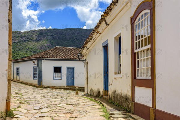Old town street with historic colonial style houses in the city of Tiradentes in the interior of the state of Minas Gerais