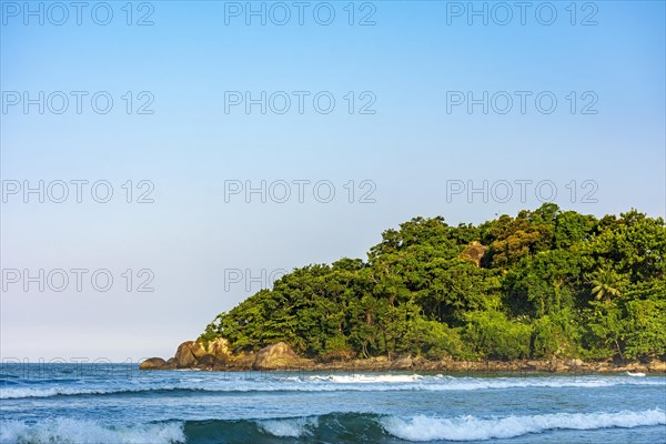 Peaceful and idyllic beach with the rainforest and the sea in Bertioga on the coast of the state of Sao Paulo