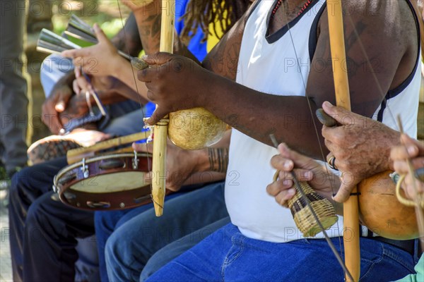 Brazilian musical instrument called berimbau and others percursion instruments usually used during capoeira brought from africa and modified by the slaves