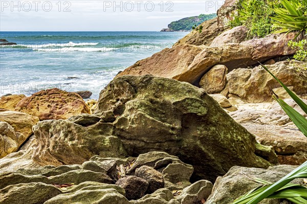 Rocky beach on the coast of Trindade in the municipality of Paraty