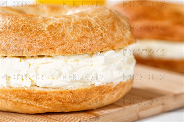 Bagel sandwich for breakfast topped with cream cheese close-up in Stuttgart