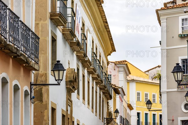 Old houses with balconies and lanterns in colonial style on the streets of Pelourinho in the city of Salvador