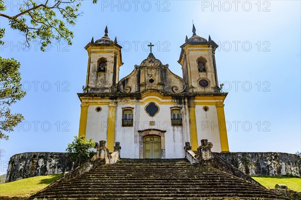 Ancient stairs and historic church of 18th century colonial architecture on top of the hill in the city of Ouro Preto in Minas Gerais
