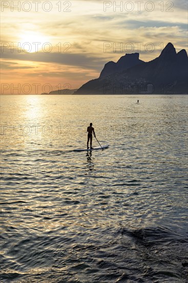 Stand up paddle at Ipanema beach in Ipanema during sunset