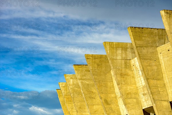 Modernist architecture of Mineirao stadium in Belo Horizonte city with its concrete columns during sunset