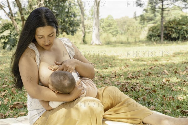 The act of breastfeeding is a nurturing moment that provides the baby with essential nutrients and creates a feeling of closeness and security