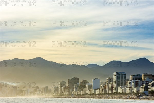 Residential buildings on the seafront of Ipanema beach in Rio de Janeiro during sunset