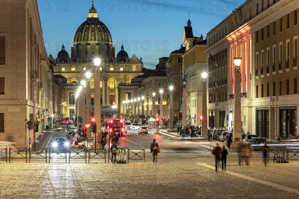 Street scene on Via della Conciliazione to St. Peter's Basilica in the evening light