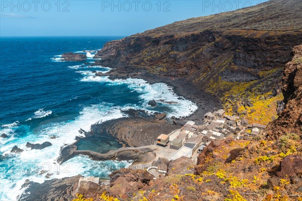 Fishing village of Pozo de las Calcosas on the island of Hierro and the cliffs. Canary Islands