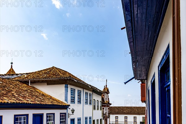 Facade of old colorful colonial houses and church in the historic town of Diamantina in Minas Gerais state