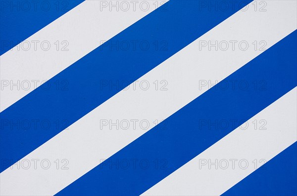 Decorative blue and white striped pattern