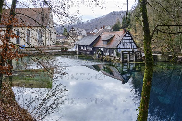 The Blautopf with historic hammer mill in Blaubeuren on the eastern edge of the Swabian Alb near Ulm