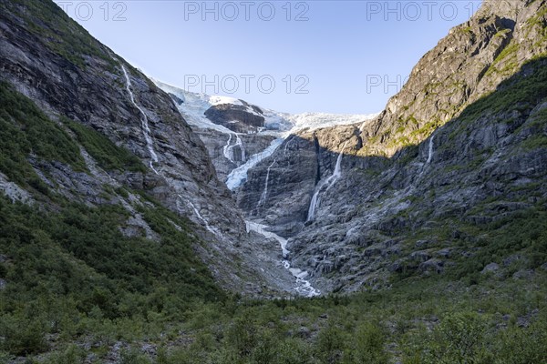 Waterfalls at the glacier tongue Kjenndalsbreen