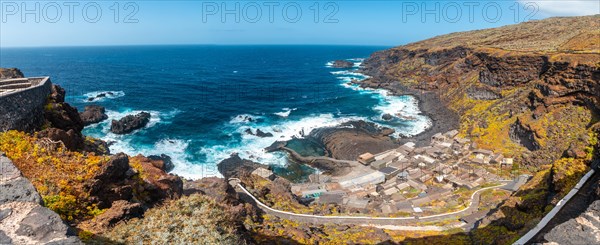 Panoramic of the fishing village of Pozo de las Calcosas on the island of Hierro and the cliffs. Canary Islands