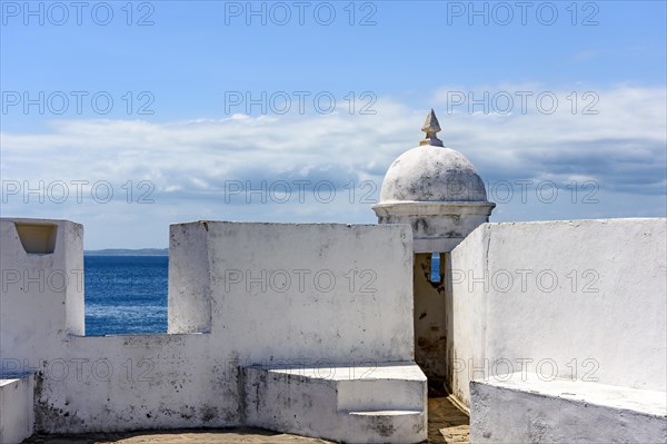 Walls and guardhouses of an old colonial fortress that was responsible for the defense of the city of Salvador in Bahia