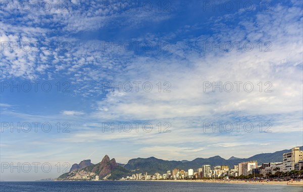 Panoramic view of the beaches of Ipanema and Leblon in Rio de Janeiro with the mountains in the background