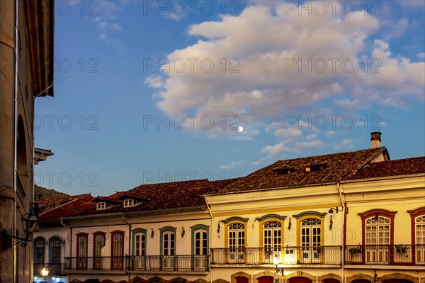 Facades of old colonial style houses with their balconies and windows in the historic city of Ouro Preto in Minas Gerais