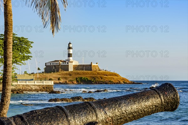 Old cannon and the Barra Lighthouse