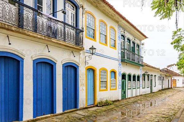 Old houses facades in colonial style on the streets of the old and historic city of Paraty founded in the 17th century on the coast of the state of Rio de Janeiro