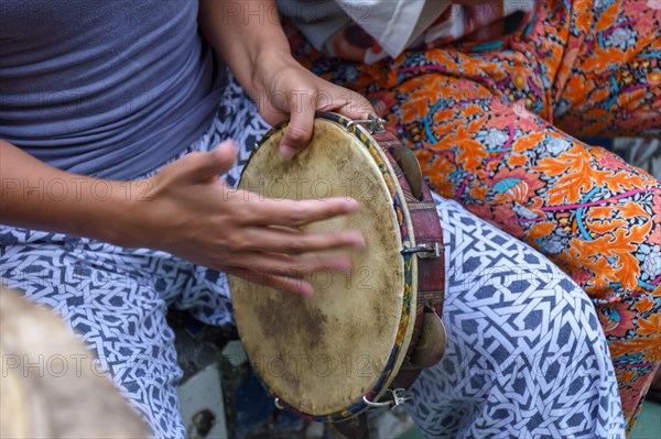 Tambourine being played by a ritimist during a samba performance in Rio de Janeiro