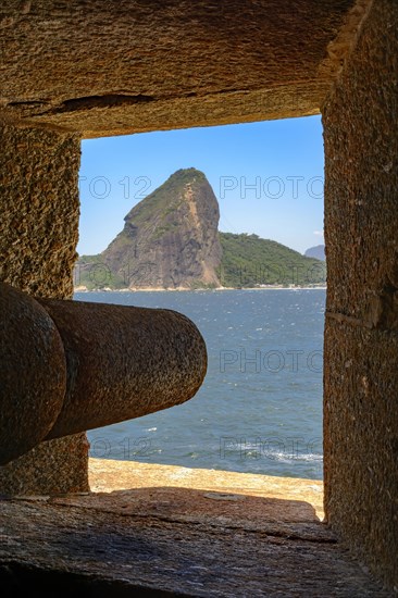 Cannon at the Fortress of Santa Cruz directed to the Guanabara Bay entrance and responsible for the defense of Rio de Janeiro at the time of the empire. You can see the Sugar Loaf hill in the background.