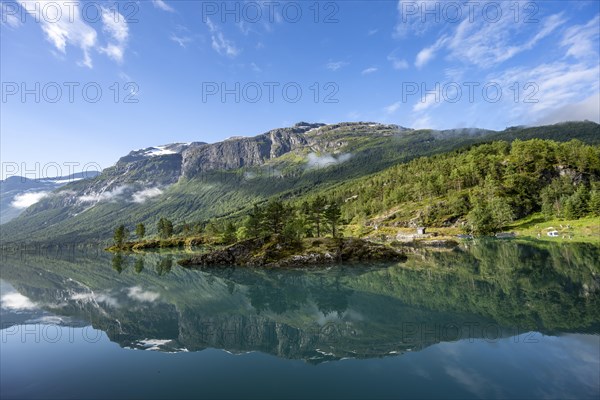 Mountains reflected in blue lake