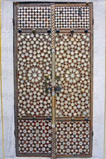Portal with wood and mother-of-pearl mosaic inside the ancient and famous Topkapi Palace in Istanbul