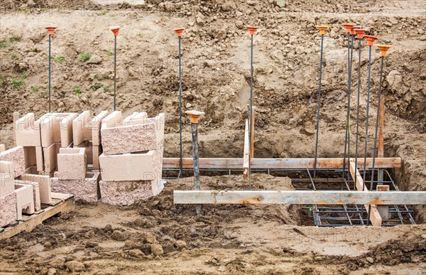 Details of a construction site with concrete blocks and rebar