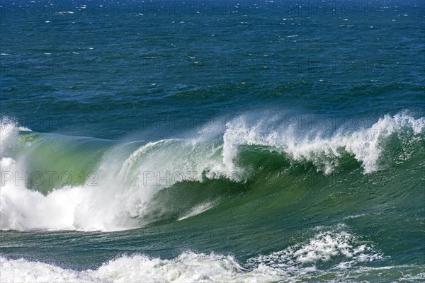 Strong wave breaking hard in the sea waters of Ipanema beach in Rio de Janeiro