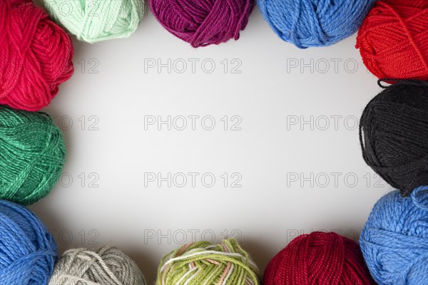 Different coloured balls of wool