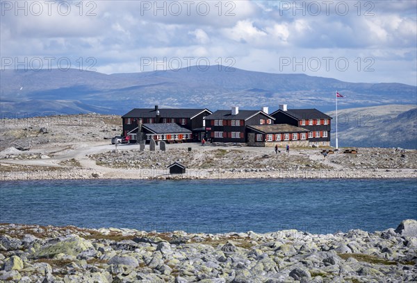 Snoheim mountain hut by a mountain lake