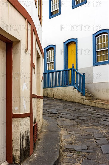 Street with cobblestones and houses with colonial architecture in the old and historic city of Diamantina in Minas Gerais