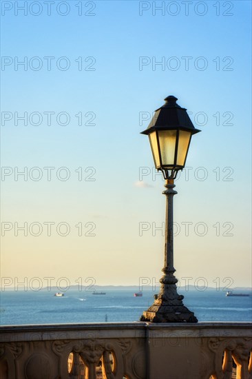 Old lamppost on the walls of the streets of Pelourinho in Salvador city