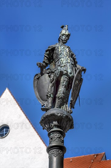 Figure of a Roman general on the heritage-protected town hall fountain from 1601