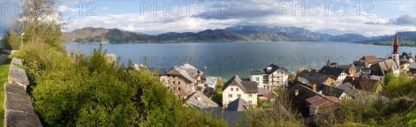 View over the village Attersee am Attersee and the evangnlical church to the lake Attersee