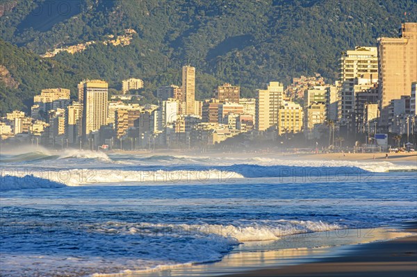 Sunrise on Ipanema beach in Rio de Janeiro with the sea