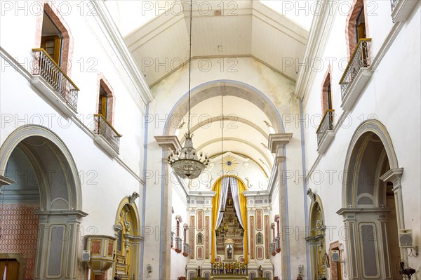 Interior and altar of a brazilian historic ancient church from the 18th century in colonial architecture in the city of Paraty