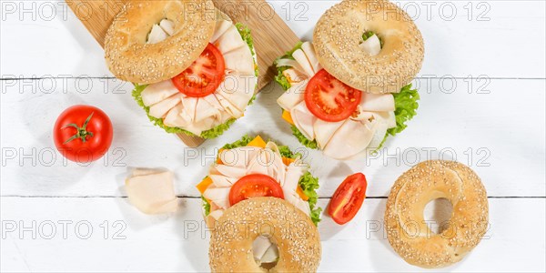 Bagel sandwich for breakfast topped with chicken ham from above Panorama in Stuttgart
