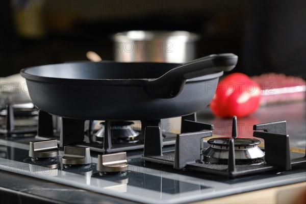 Low angle view of frying pan on a modern gas stove