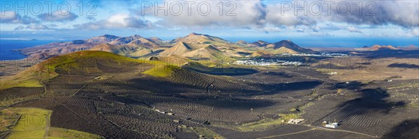 Panorama at sunrise from the Montana de Guardilama to the wine-growing area La Geria