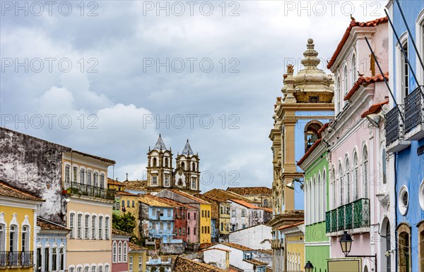Colorful historical colonial houses facades and antique church towers in baroque and colonial style in the famous Pelourinho district of Salvador