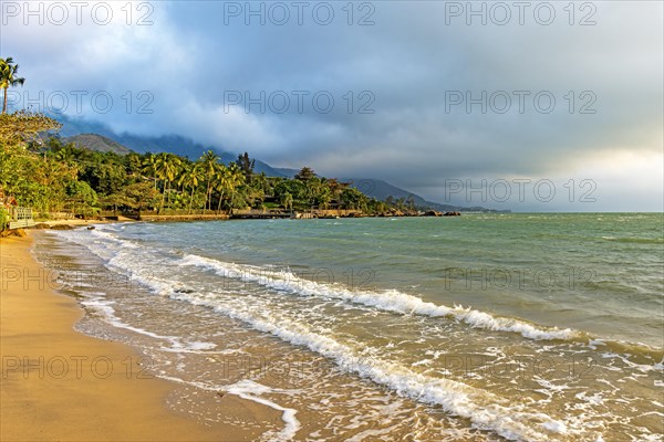 Sunset on one of the paradisiacal beaches on the island of Ilhabela in Sao Sebastiao on the north coast of the state of Sao Paulo